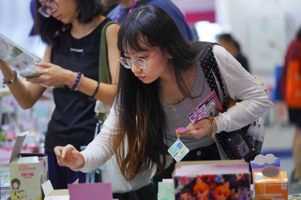 看文化IP如何出圈落地？来南国书香节参观体验